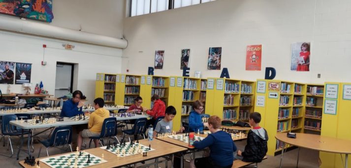 Campers form new friendships over the board in games paired by skill level