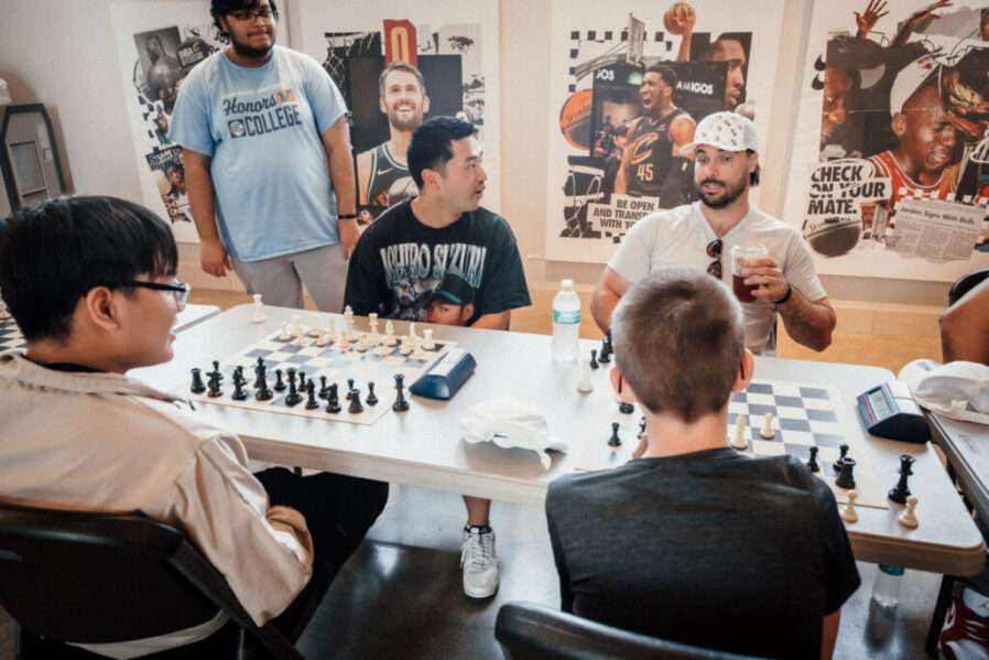 Stephen Kwan questions Austin Hedges on his game against rising star Marcus Bemak of the CMSD team.